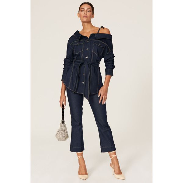 Blue denim (77% cotton, 21% polyester, 2% elastane). Collared button-up shirt. Off the shoulder. Three-quarter sleeve. Front button closure. 29" from shoulder to hemline. Imported. Rent The Runway, Three Quarter Sleeves, Quarter Sleeve, Three Quarter, Blue Denim, Off The Shoulder, Capri Pants, Button Up Shirts, Button Up