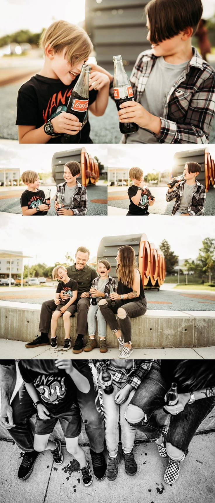 two boys sitting next to each other with hot dogs in front of them and one boy holding a bottle