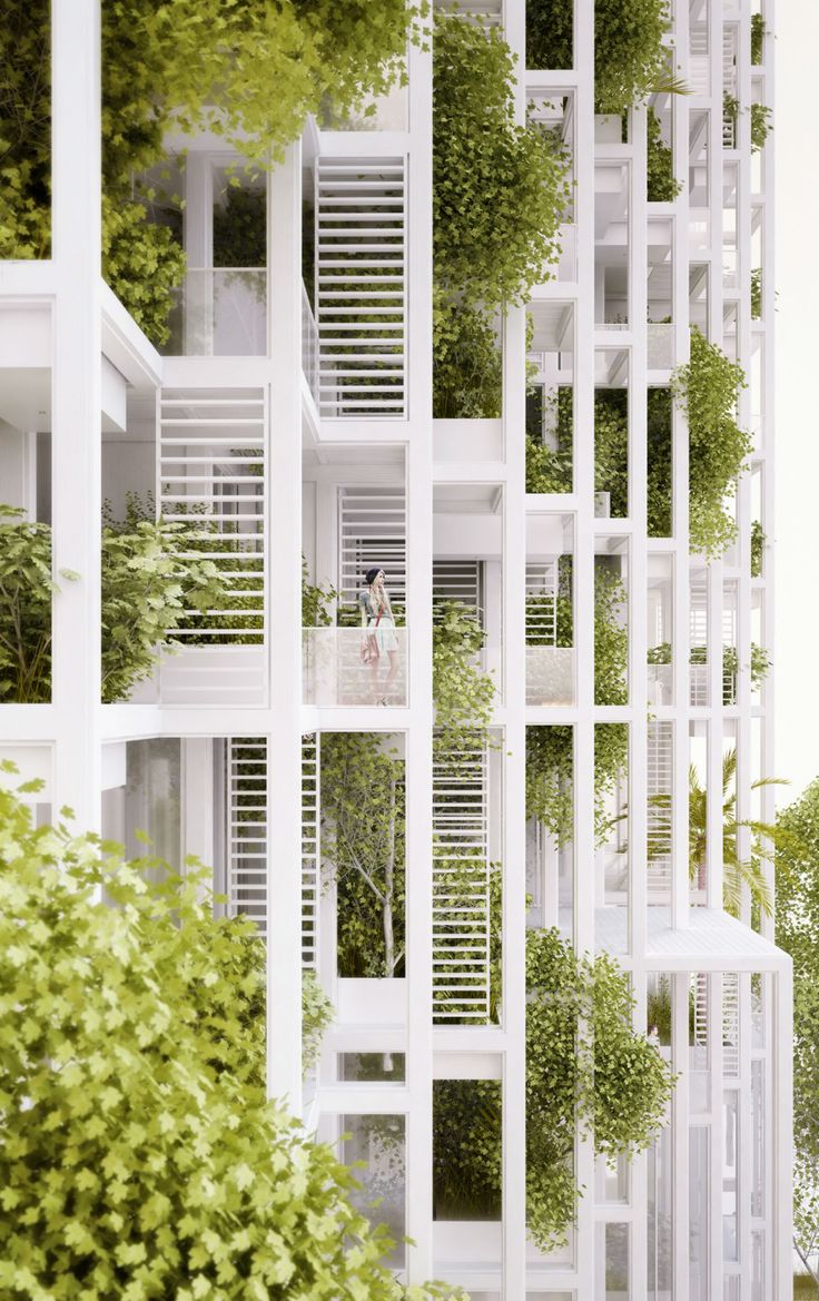 an architectural rendering of a white building with plants growing on the sides and balconies