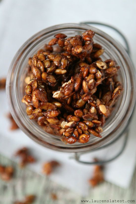 nuts are in a glass jar on a table