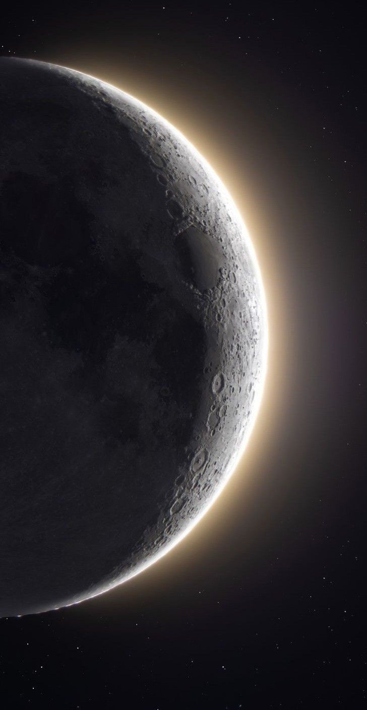 an artist's rendering of the moon in space with light shining on its side