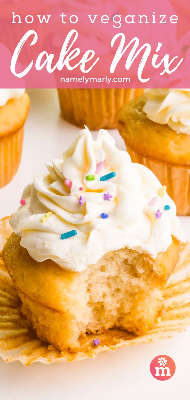 a cupcake with white frosting and sprinkles on top is shown