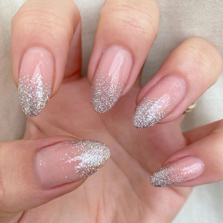 Clear Nails With Silver Glitter, Oval Glitter Ombre Nails, Natural French Tip Nails With Glitter, Silver Acrylic Nails Almond Shape, Silver Fade Nails, Silver Glitter Fade Nails, Glitter Nails Ombre Sparkle, Silver Glitter Ombre Nails Almond, Nail Art Designs Silver Glitter