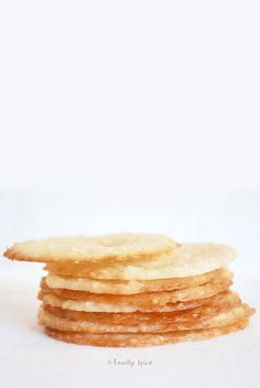 a stack of crackers sitting next to each other on top of a white surface