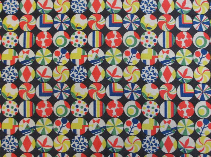 an abstract pattern with circles and stars on black background, in red, yellow, green, blue, orange, and white colors