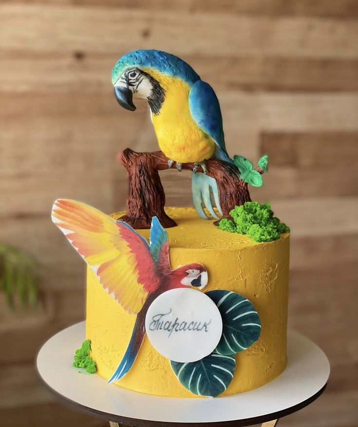 there is a cake decorated with birds on it