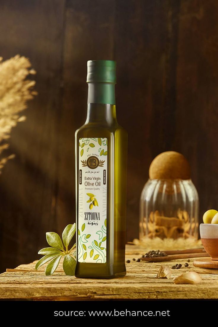 a bottle of extra virgin olive oil sitting on a table