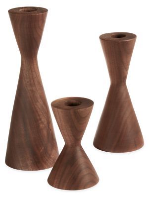 three wooden vases sitting next to each other