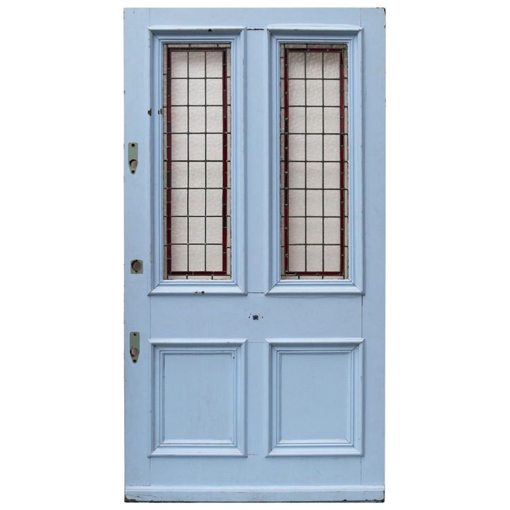 a blue door with two glass panels on the top and bottom panel, against a white background