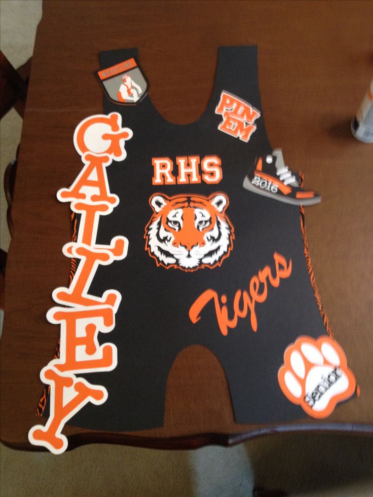 an orange and black tiger jersey on a table