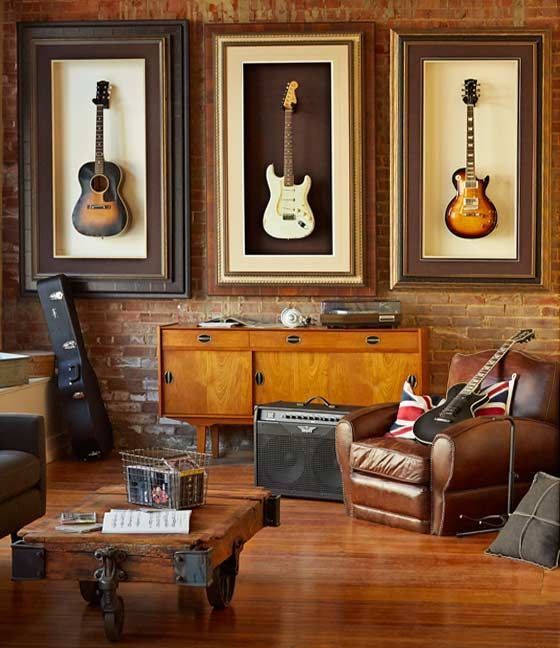 a living room with guitars on the wall and music memorabilia in front of it that reads, no music no life know music know life