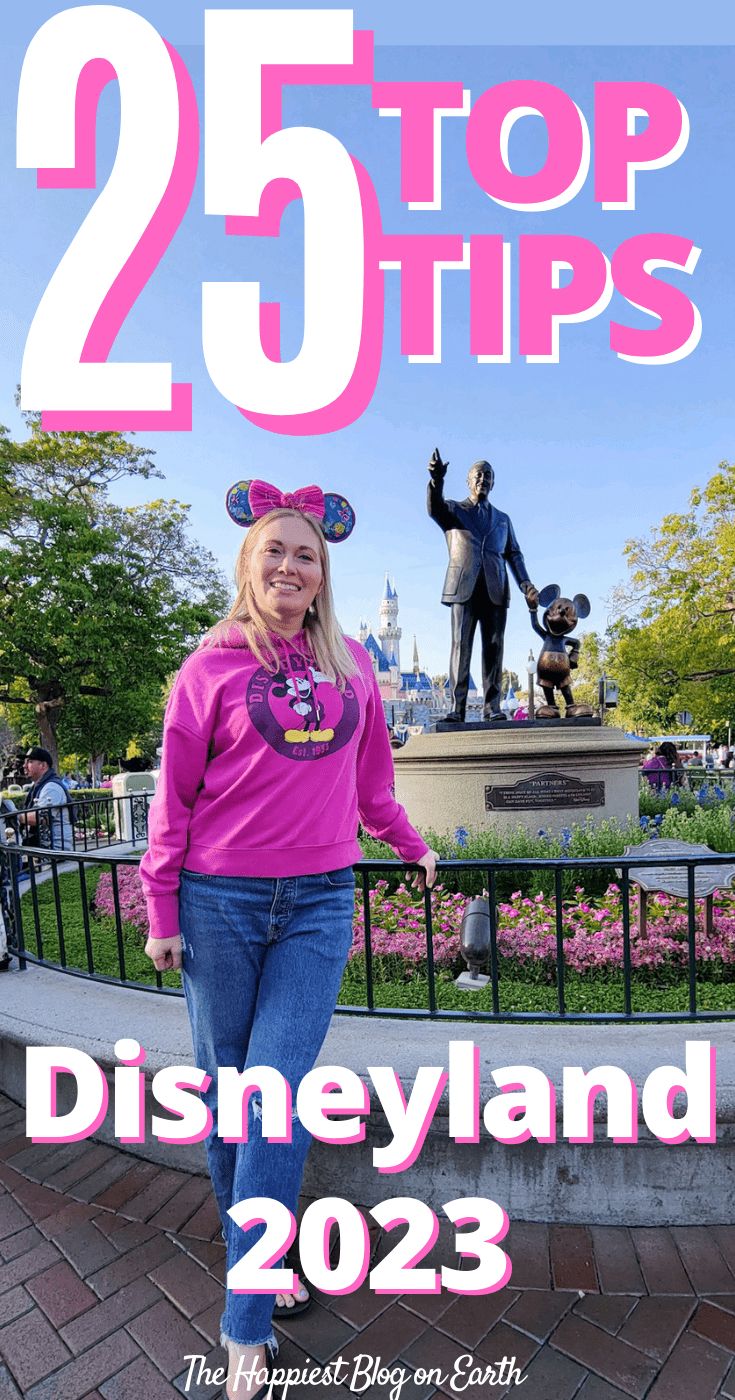 a woman standing in front of a statue with the words 25 top tips disneyland 2013