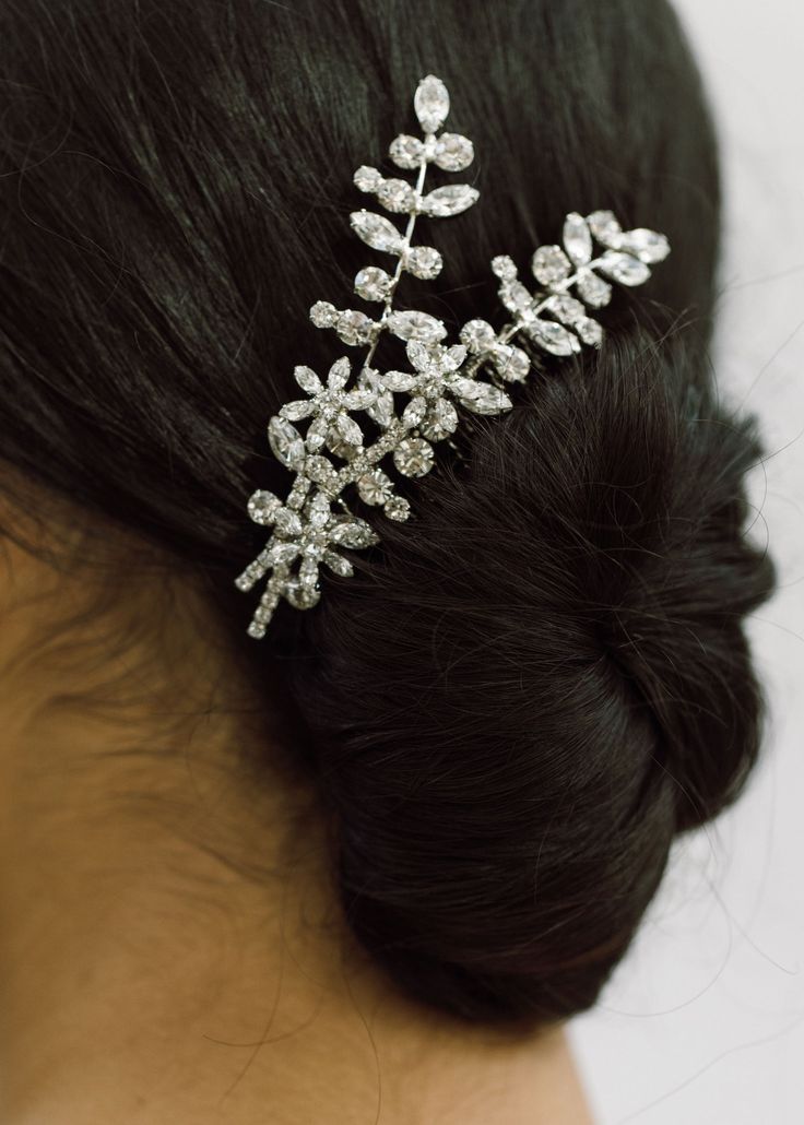 The Elissa Comb features a romantic botanical motif, with Swarovski crystals forming a floral arrangement in the hair. The best part is, this future-heirloom will last much longer than fresh blooms. The Elissa Comb can be worn countless ways, with hair up or down, and can be paired with a veil as well. Dimensions: 4 x 2.25 inches Weight: 25g Luxury Hair Accessories, Hair Up Or Down, Jennifer Behr, Luxury Hair, Bridal Shop, Fashion Shoot, Floral Arrangement, A Romantic, Hair Comb