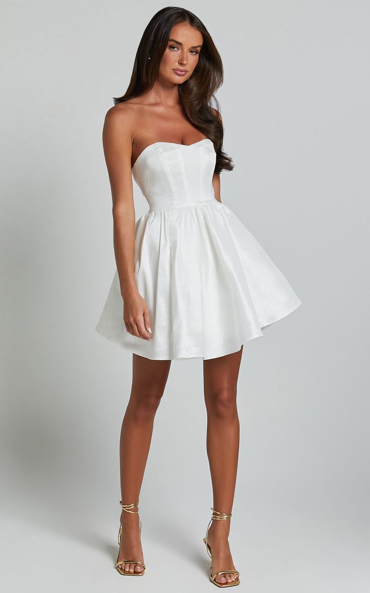 Jayde Mini Dress - Strapless Sweetheart Fit And Flare Dress in White White Formal Short Dress, Strapless Flare Dress, White Fit And Flare Dress Short, Short White Dress Wedding Receptions, Flirty Strapless Mini Dress For Bridesmaids, Flirty Mini Strapless Dress For Bridesmaid, Flirty Prom Dress With Sweetheart Neckline, Flirty Sweetheart Neckline Prom Dress, Summer Corset Dress With Sweetheart Neckline For Homecoming