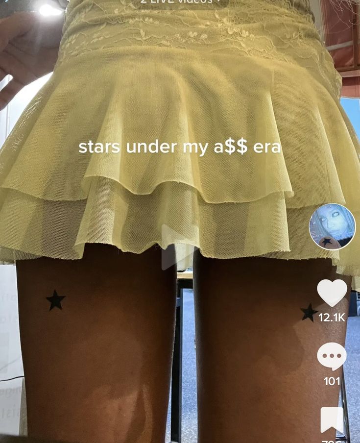 the back of a woman's skirt with stars under her as $ 5 era