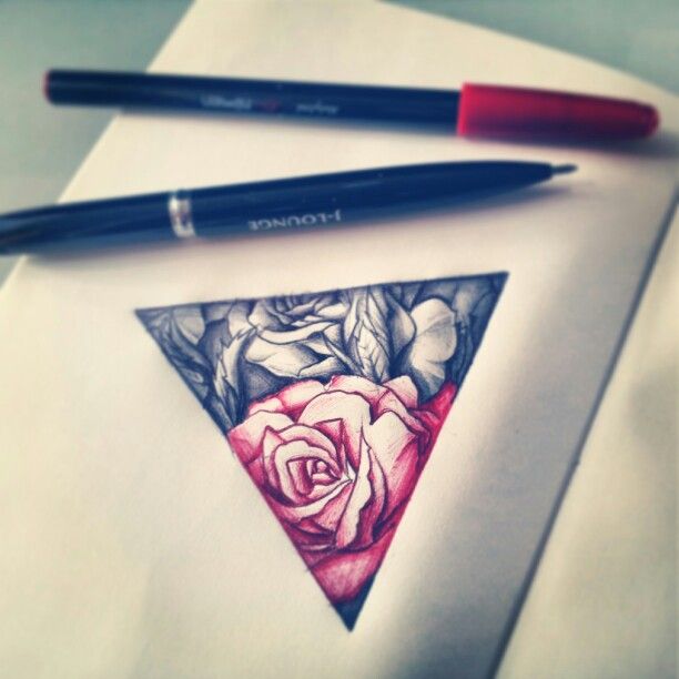 a drawing of a rose and two pencils