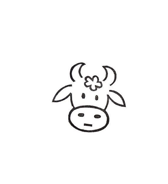 a cow with a flower on its head is drawn in black and white, it looks like