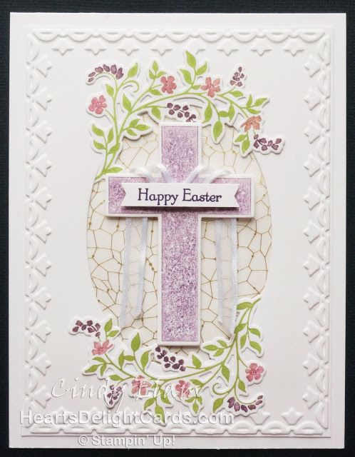 a card with a cross on it and flowers around the edges that says happy easter