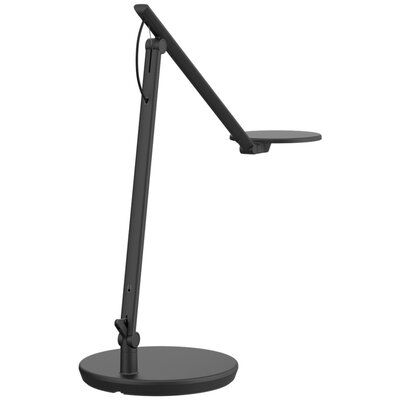 a black desk lamp on a white background