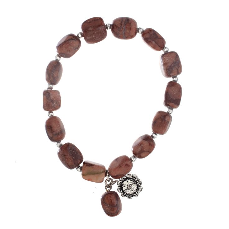 "Find the John Bead Jasper Brown Natural Stone Stretch Bracelet with Flower Charm at Michaels. com. This handmade bead bracelet, made using brown jasper beads and a silver flower charm, will make a fantastic addition to your accessory collection. Called the stone of fairness and justice, jasper is a beloved stone that adds instant polish to any ensemble. This handmade bead bracelet, made using brown jasper beads and a silver flower charm, will make a fantastic addition to your accessory collecti Elegant Brown Stretch Bracelet With Round Beads, Brown Jasper Beaded Bracelets Gift, Brown Jasper Bracelets With Round Beads, Brown Jasper Gemstone Bead Necklaces, Brown Jasper Bracelets With Natural Stones, Brown Bracelet, Jasper Beads, Bracelets Handmade Beaded, Flower Charm