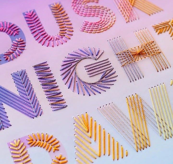 the letters and numbers are made out of sticks