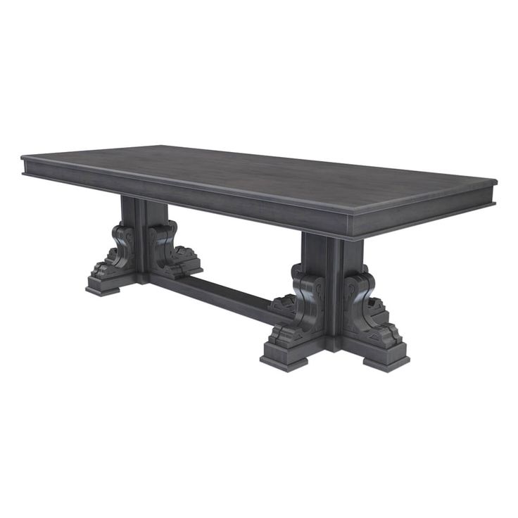 a black table with two ornate legs