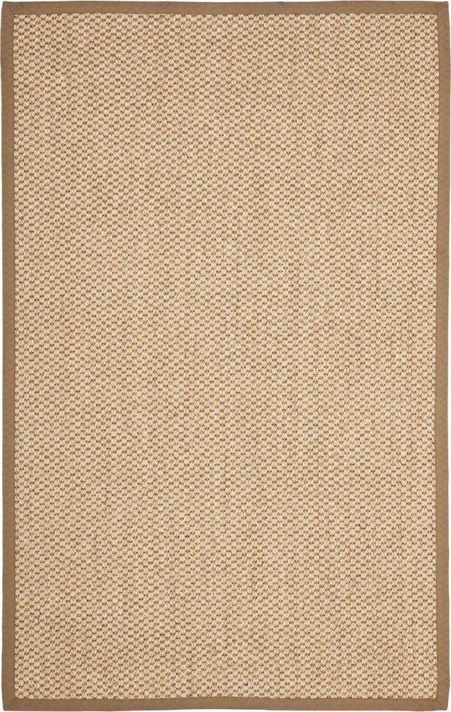 a beige and brown area rug on a white background