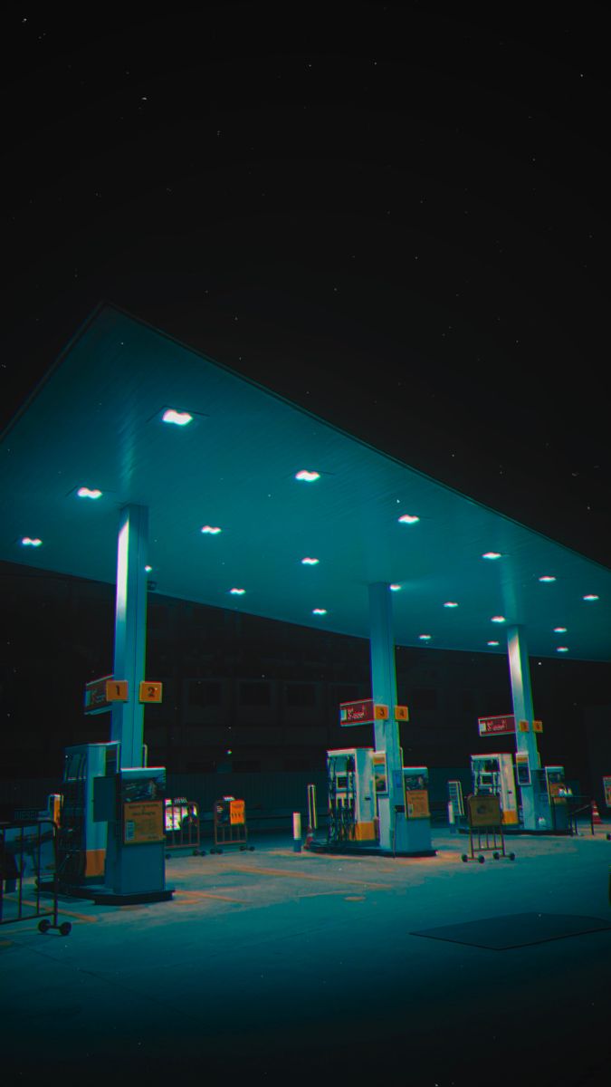 an empty gas station at night time