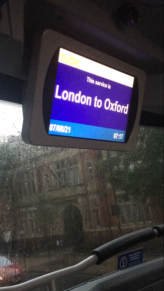 the london to oxford bus sign is posted above the windshield