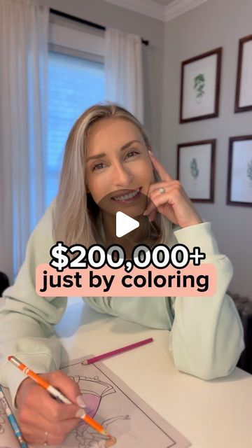 a woman sitting at a table with a pencil in her hand and the words $ 200, 000 just by coloring