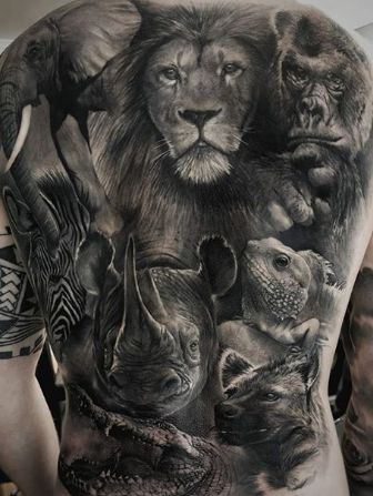 a man's back with many different animals on it