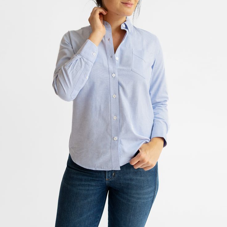 The Blue Oxford shirt is one of the most timeless and versatile pieces in the service industry, able to be dressed up with a blazer, or down with jeans and sneakers. The updated and upgraded version of our Service Oxford features an equally durable but much softer 75/25 cotton poly blend, as well as cleaner stitching, a crisper collar, and an improved fit. Features: Button-down collar, clean finished seams Material: 75% Cotton, 25% Polyester, 4oz Blue Oxford Cloth Fit: Model is 6'0"/170 lbs, wea Classic Light Indigo Button-up Shirt, Blue Relaxed Fit Shirt For Work, Washed Blue Cotton Shirt For Work, Washed Blue Cotton Shirt For Workwear, Washed Blue Cotton Workwear Shirt, Unstructured Washed Blue Shirt For Work, Classic Light Indigo Button-up Tops, Light Indigo Tops With Button Closure For Workwear, Classic Washed Blue Shirt For Workwear