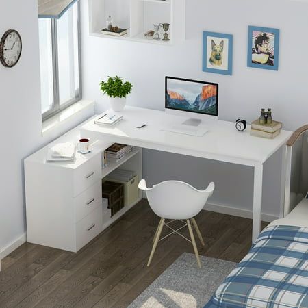 a white desk with a computer on it in a bedroom next to a bed and window