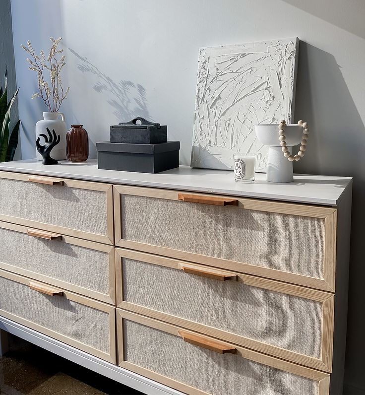 an ikea tarava dresser has drawers on it