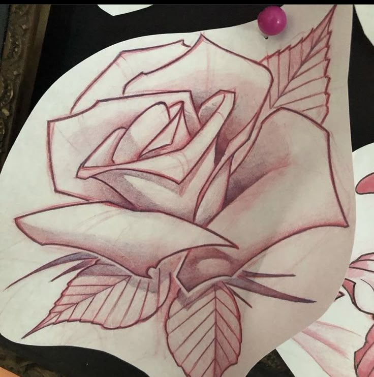 a drawing of a rose on someones stomach