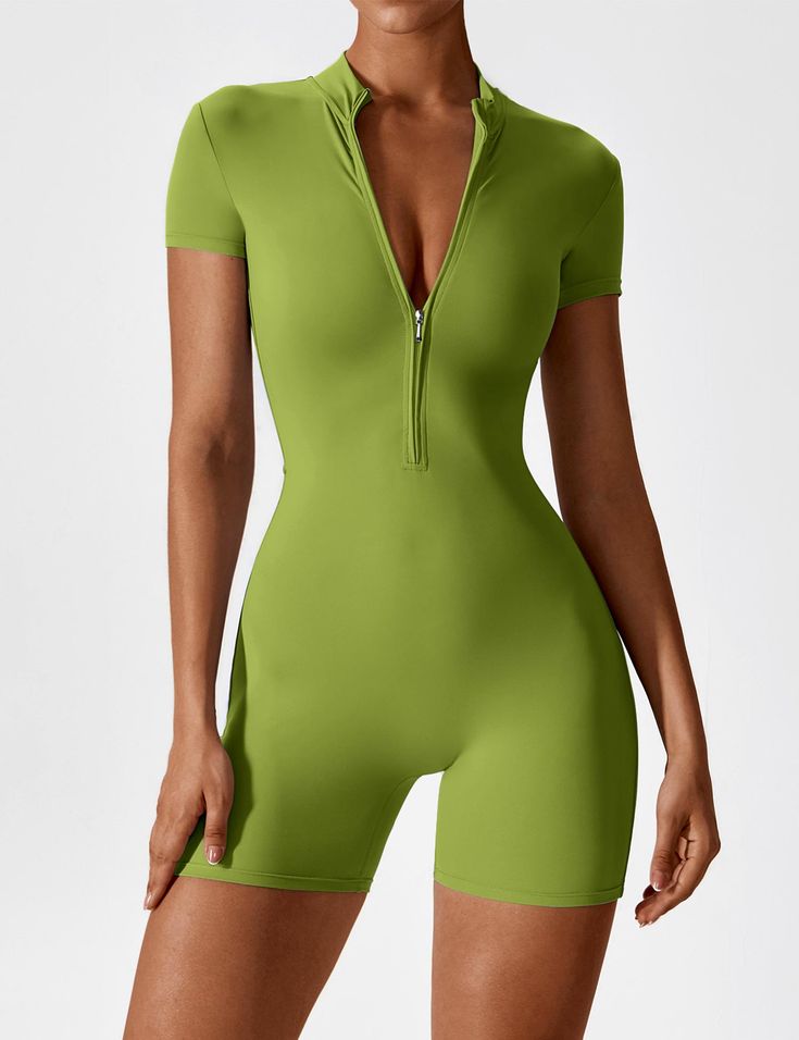 Our Short Sleeve Zipper Romper is designed for summer activities, featuring a trendy half-zipper stand collar for easy wear. Its cinched waist defines your silhouette, making it ideal for casual outings, sports, or workouts. Stay comfortable, confident, and stylish in this versatile romper!   Feature     Half-zip stand-up collar design  Slim-fit cinched waist design    No cup padding    Easy to put on and take off    Butter-soft, feels like a second skin     Fabric    78% Nylon + 22% Spandex Bodycon Romper Jumpsuit, Zip Up Romper, Shorts Bodysuit, Workout Jumpsuit, Leather Bodysuit, Fitted Jumpsuit, Sport Bra Top, Short Sleeve Romper, Sleeveless Bodysuit