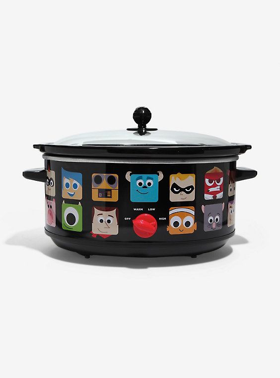 a black crock pot with cartoon characters on the front and sides, sitting against a white background