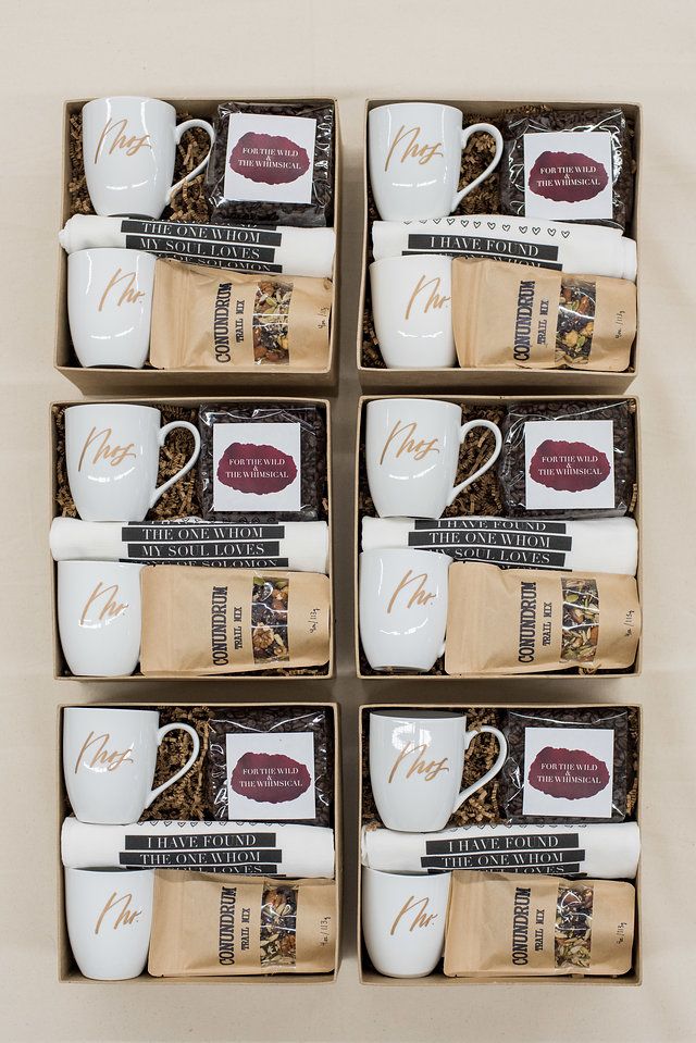 six coffee mugs are arranged in a box