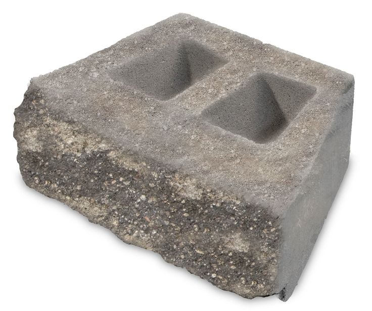 a concrete block with two holes in it on a white background, there is no image here to provide a caption for