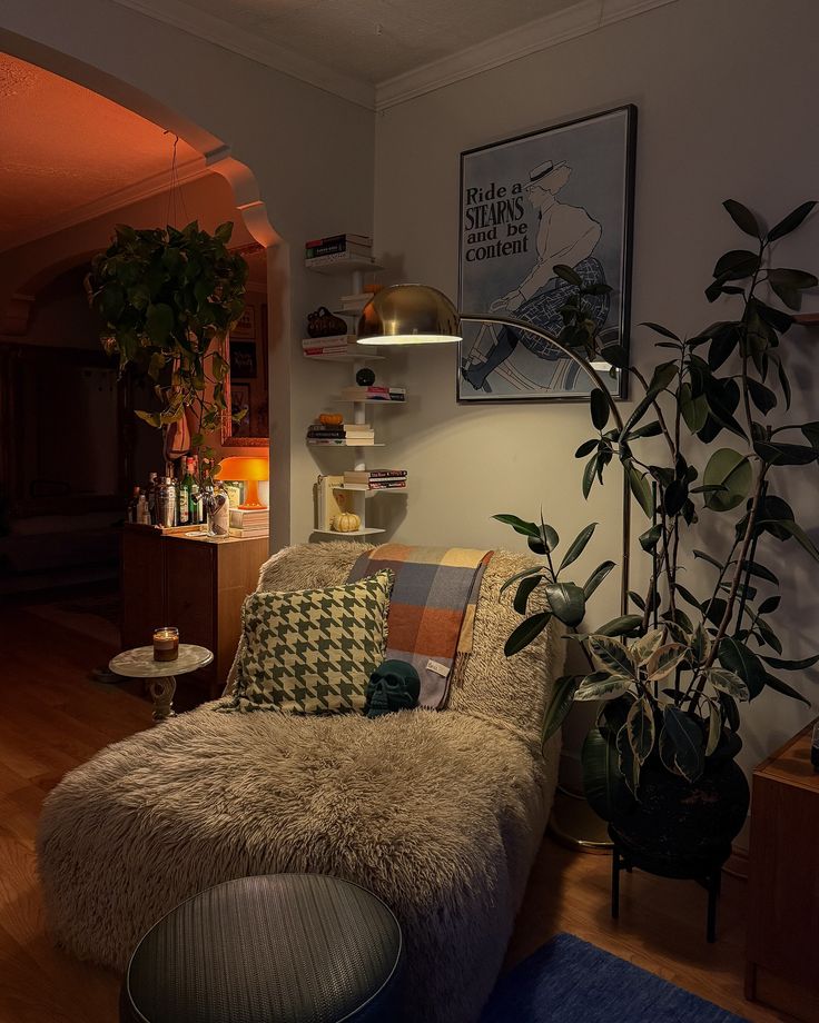 a living room filled with furniture and plants