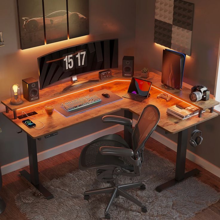 a desk with a chair and computer on it