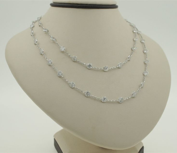 Vintage handmade 14K white gold natural white topaz necklace.  This stunning necklace is 30 inch long and has 53 natural white topaz. Each stone weighs 0.35 ct. and is 10mm spaced on a cable chain. Total topaz weight: 18.5 ct. Chain thickness: 0.95mm Total necklace weight: 10.4g Hallmarks: 14K Will be placed into a suitable gift box Free shipping within the U.S. Larchmont Ny, Topaz Necklace, Wedding Jewellery Necklace, Stunning Necklace, White Topaz, Wedding Necklace, Cable Chain, Wedding Jewelry, Necklace Etsy