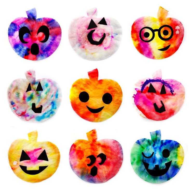 six watercolor pumpkins with faces painted on them, all in different colors and shapes