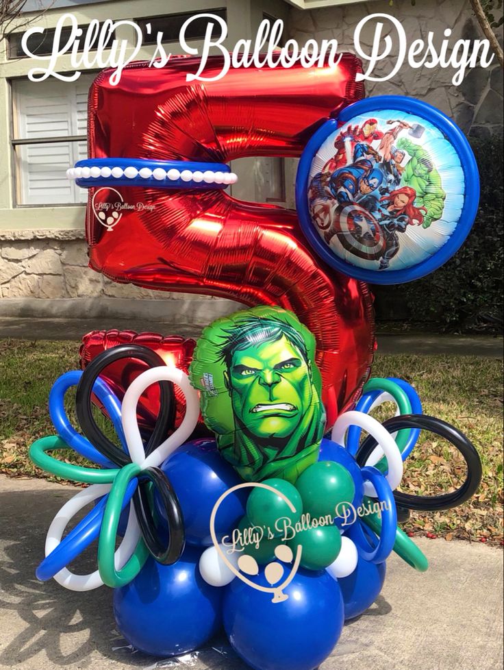 an image of a birthday decoration with balloons and balloons in the shape of hulk's head