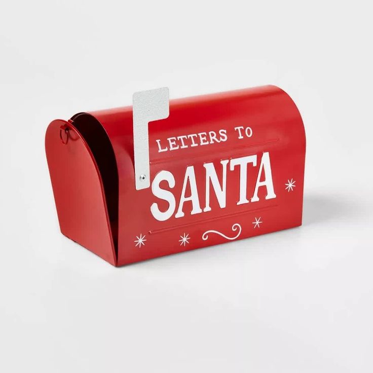 a red mailbox with letters to santa written on it