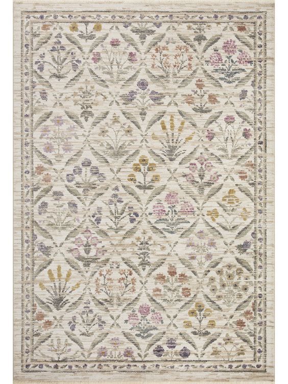 an area rug with various flowers and leaves on the side, in neutral colors is shown