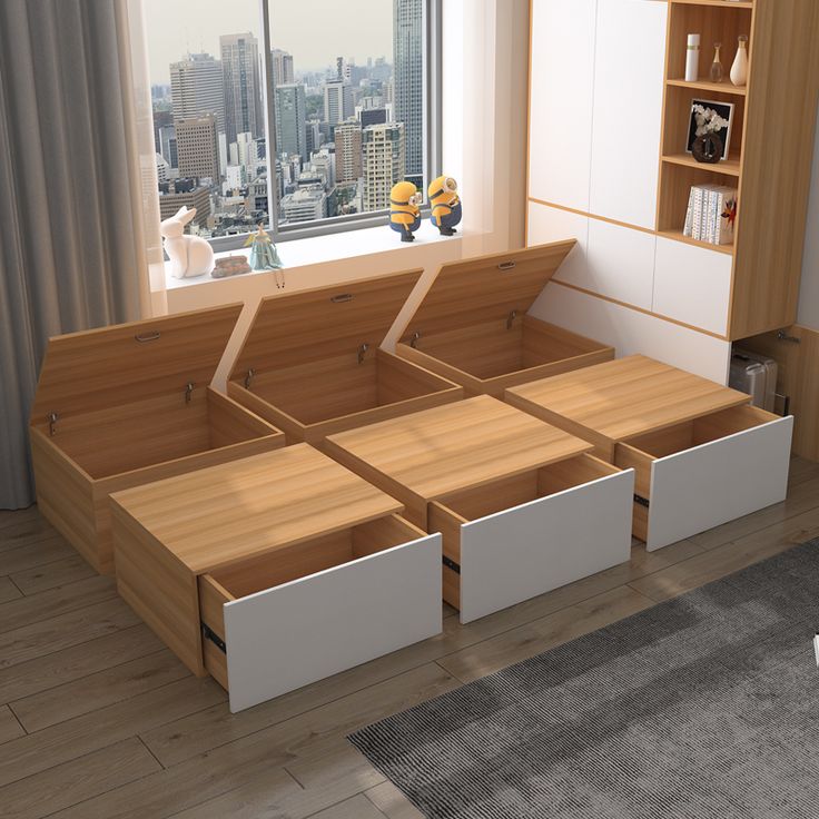 the bed is made up with four drawers