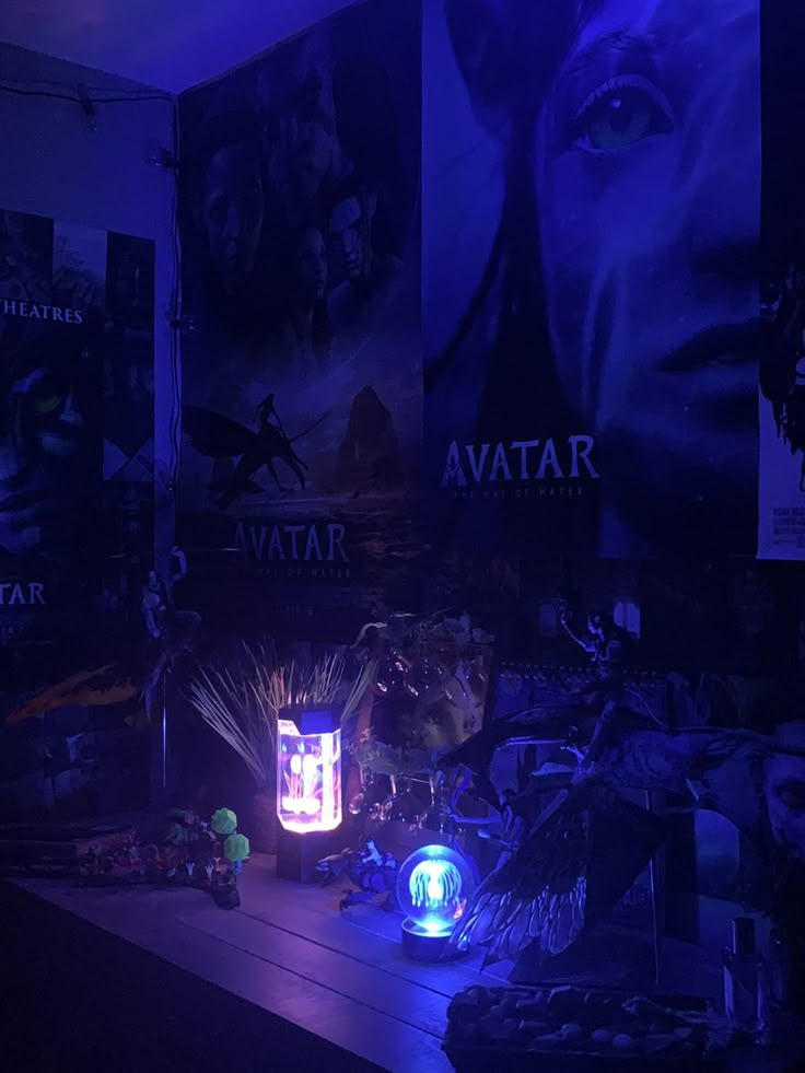 a dark room with posters on the wall and lights in the floor, along with toys