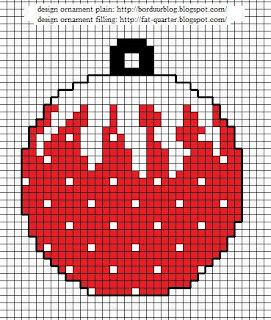 a cross stitch christmas ornament in red and white