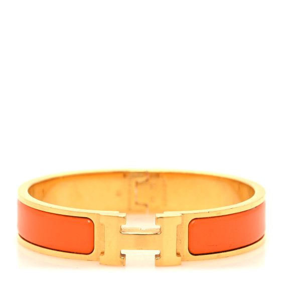 This is an authentic HERMES Enamel Narrow Clic Clac H Bracelet PM in Orange. This chic bracelet is made of gold-plated hardware with a swivel H and features an orange enamel inlay. Hermes Bracelet, Hermes Jewelry, Chic Bracelet, Plating, Orange, Things To Sell, Gold